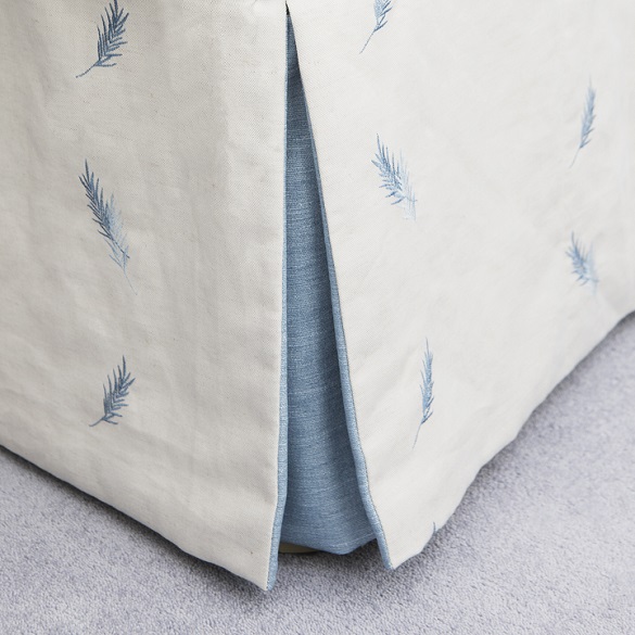 Bed Valance With Blue Accent Matching Curtains and Cushions